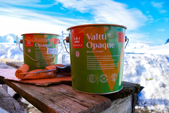 Two tins of specialist Tikkurila orange paint