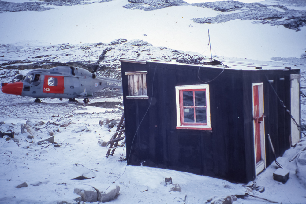 Blaiklock hut with a helicopter next to it