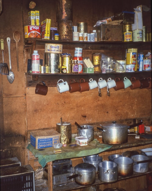 cooking utensils and ingredients inside the hut