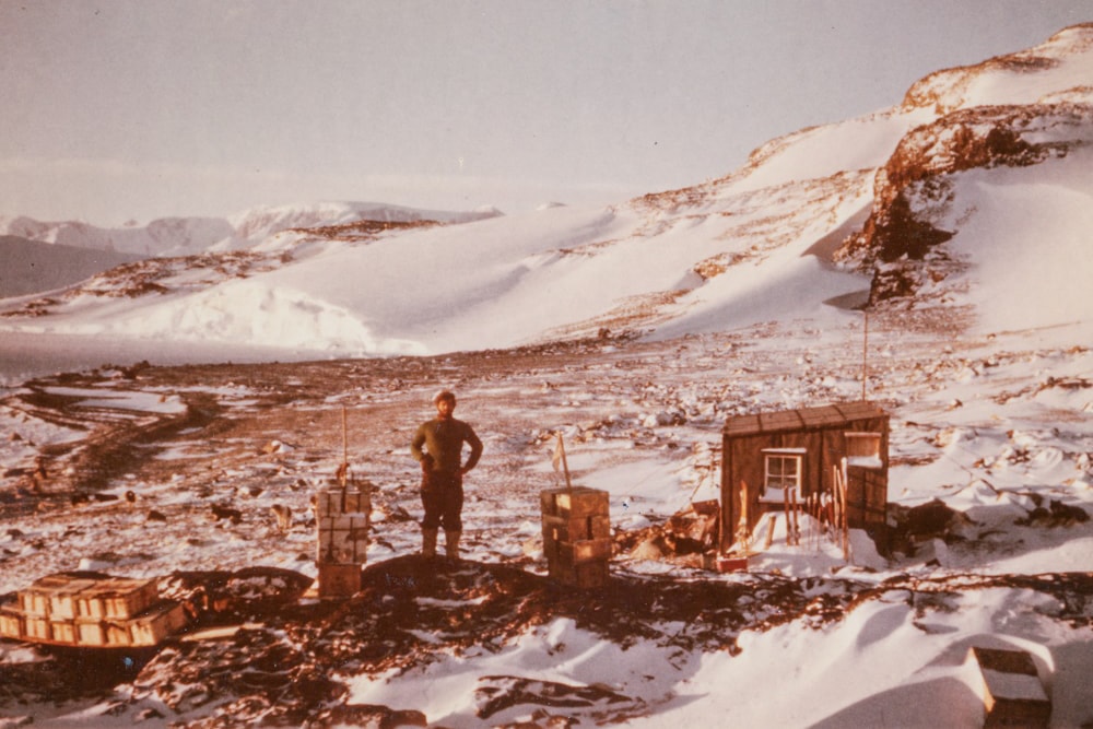 A wide shot of a man standing besides Blaiklock Island Refuge