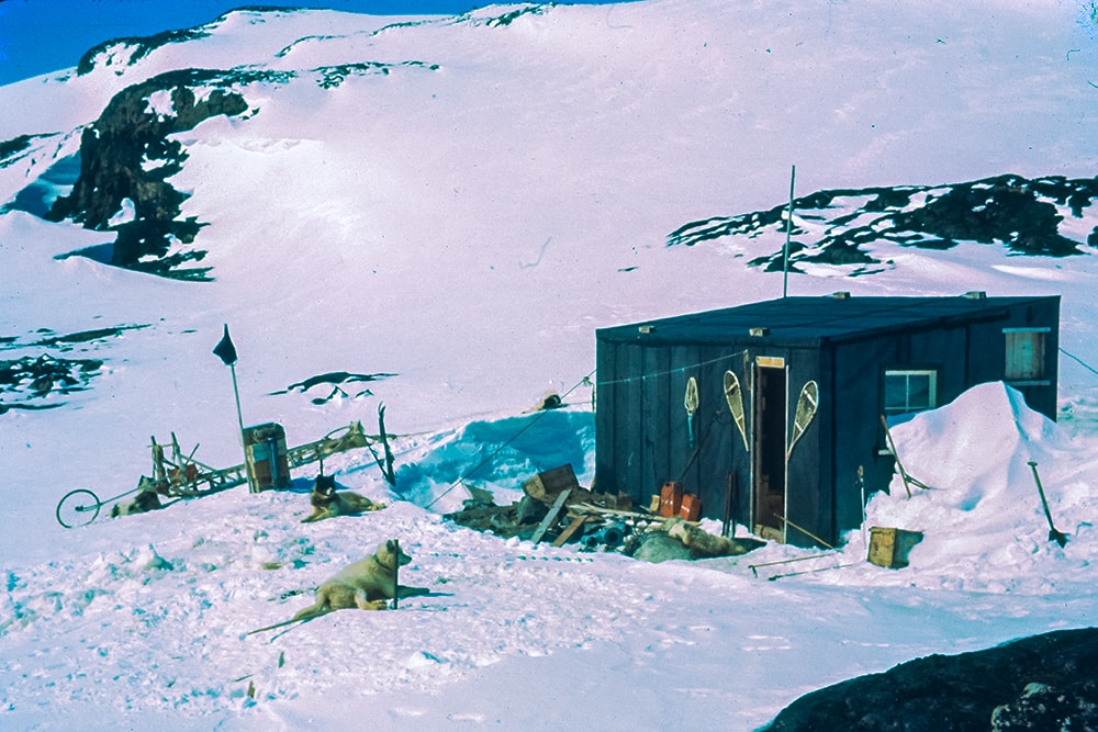 Blaicklock with drifted snow around the refuge hut in spring
