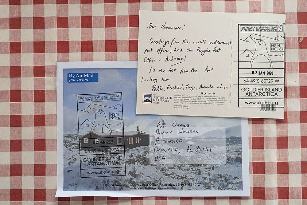 Close-up of the written postcard and evelope