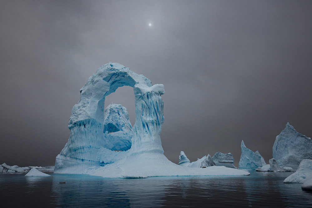 An iceberg with an arch